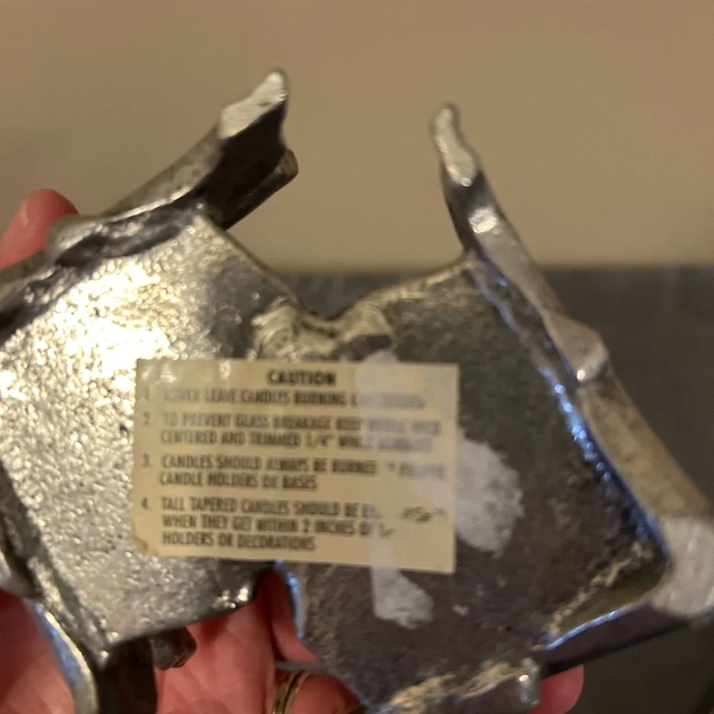 Pewter candle holder features hummingbirds and hearts